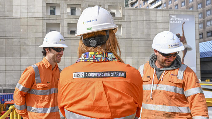 Woman and two men on site