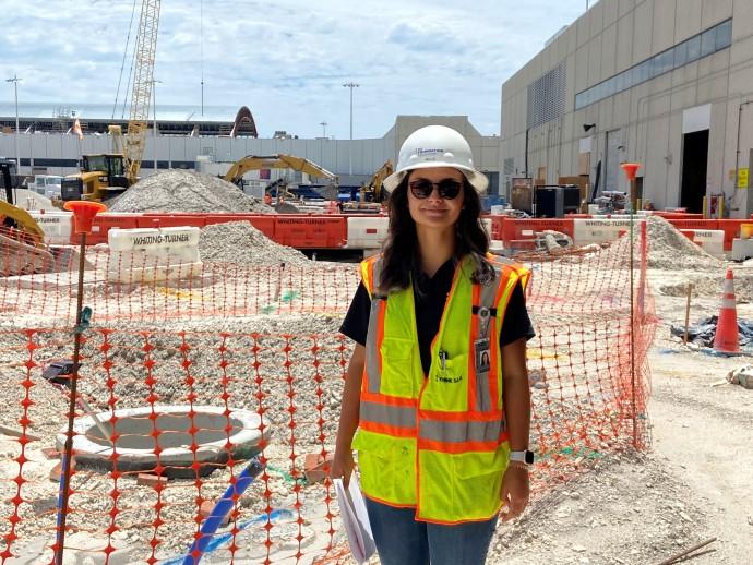 Woman standing at jobsite